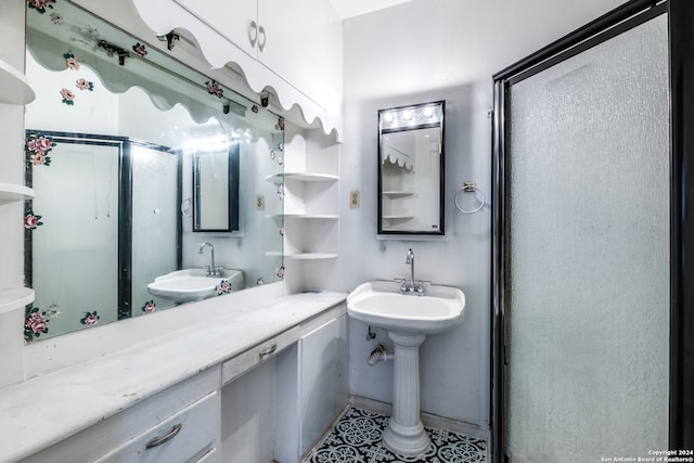 bathroom with sink and tile flooring