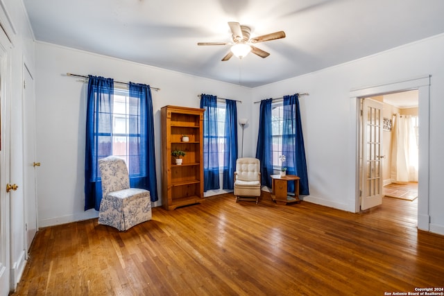 unfurnished room featuring ceiling fan and hardwood / wood-style flooring