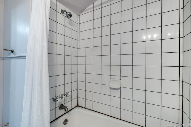 bathroom with shower / tub combo