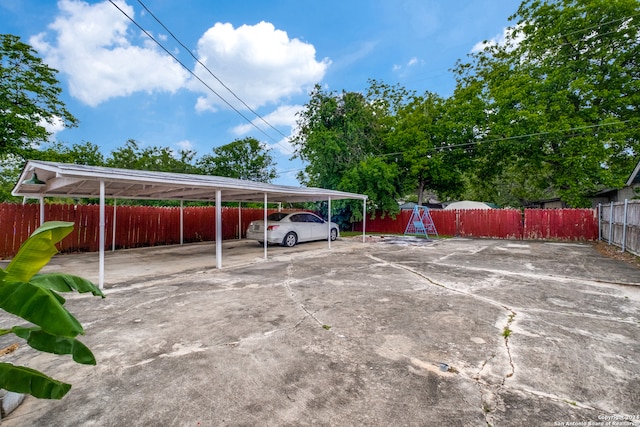 view of car parking with a carport