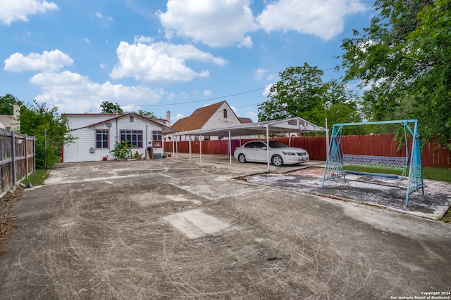 view of yard featuring a carport