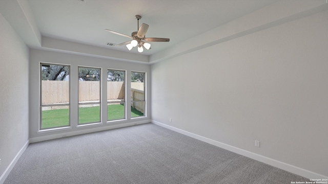 unfurnished room with carpet floors and ceiling fan