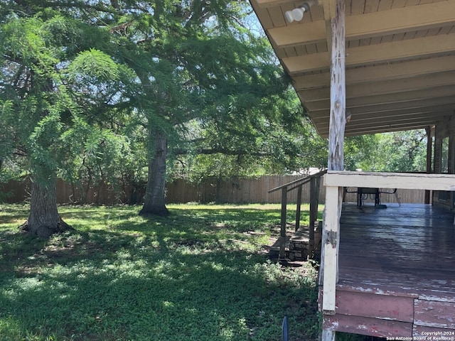 view of yard with a deck