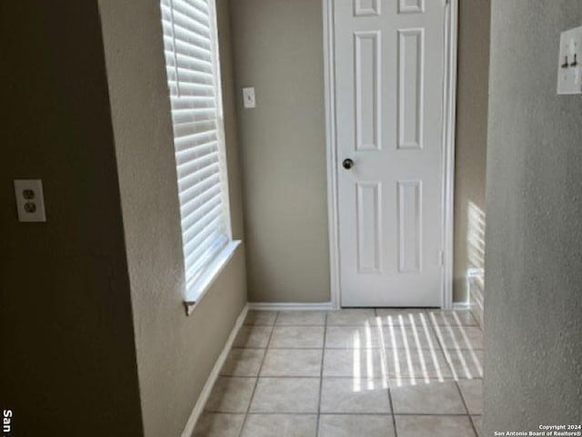 interior space with light tile floors