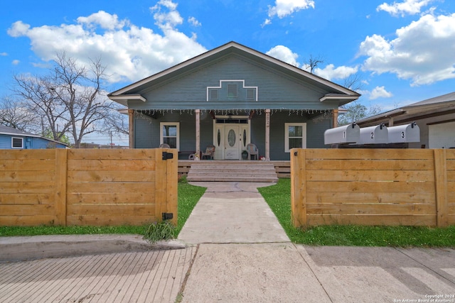 bungalow-style house featuring covered porch