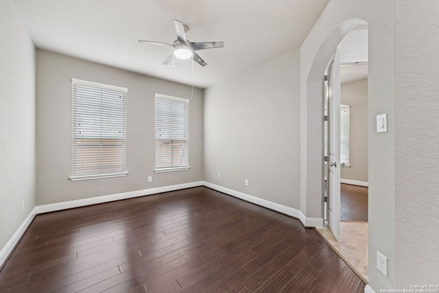 unfurnished room with tile flooring and ceiling fan