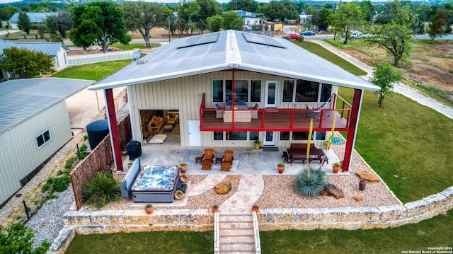 view of front of house featuring a patio, a front yard, and an outdoor hangout area