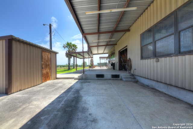 view of patio / terrace featuring a carport