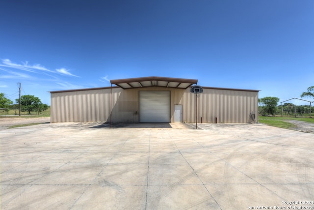 view of outdoor structure featuring a garage