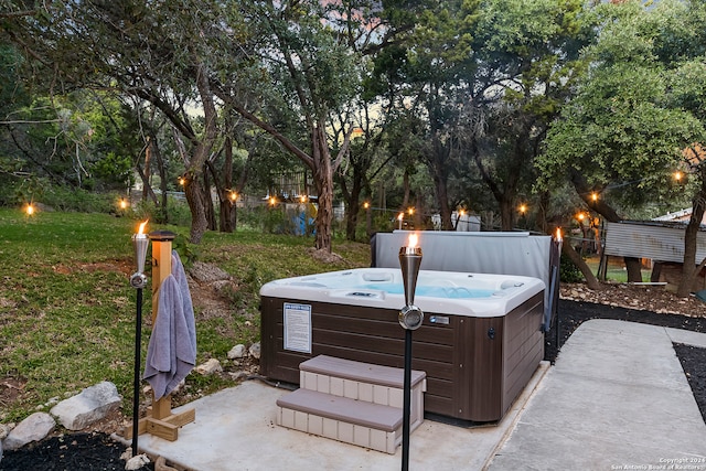 view of patio with a hot tub