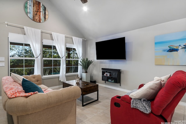 living room featuring light tile patterned floors and high vaulted ceiling