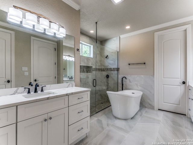 bathroom with tile flooring, a textured ceiling, crown molding, vanity, and a shower with door