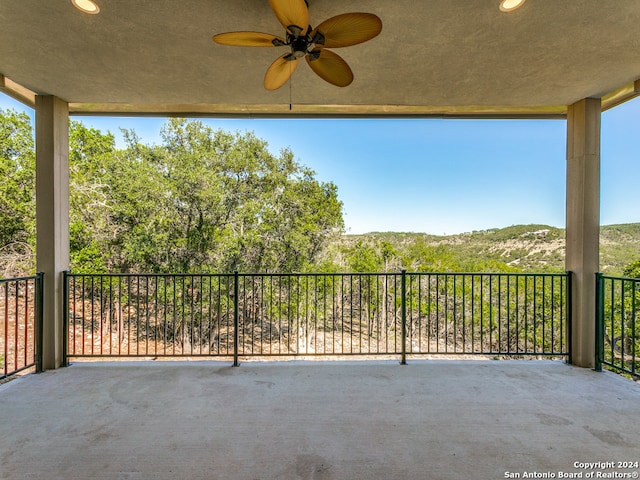 view of terrace featuring ceiling fan