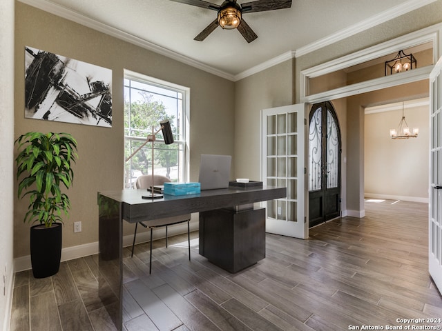 office with ceiling fan with notable chandelier, french doors, hardwood / wood-style flooring, and ornamental molding