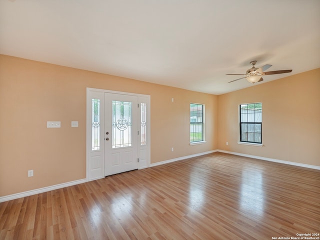 foyer featuring ceiling fan and light wood-type flooring