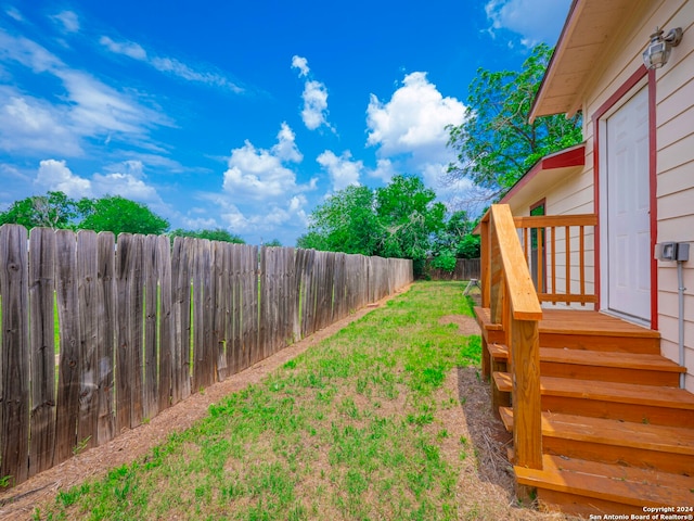 view of yard featuring a deck