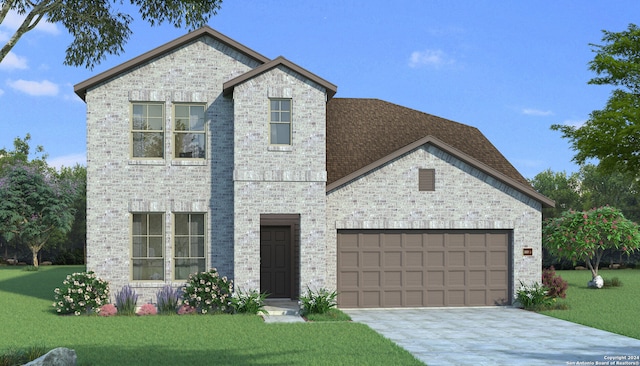 view of front of house featuring a garage and a front yard