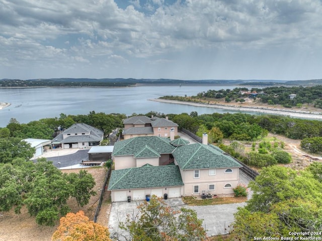 drone / aerial view with a water view