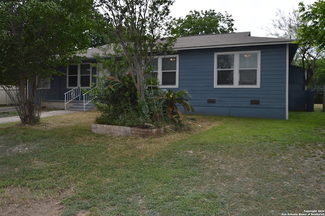 exterior space featuring a front yard