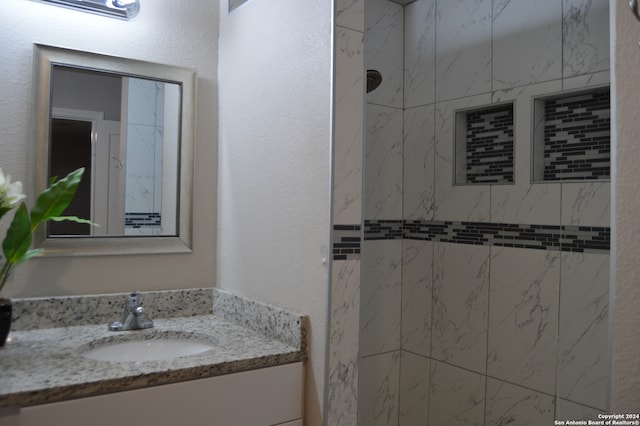 bathroom featuring vanity with extensive cabinet space