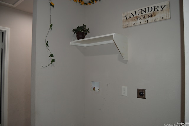 washroom with hookup for an electric dryer and hookup for a washing machine