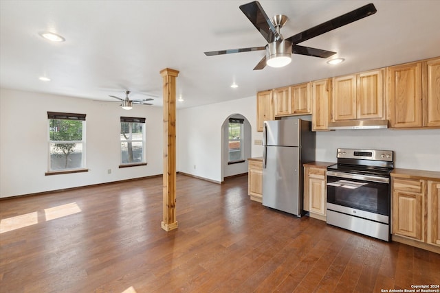 kitchen featuring light brown cabinetry, ceiling fan, stainless steel appliances, and dark hardwood / wood-style flooring