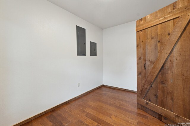 spare room featuring dark hardwood / wood-style floors