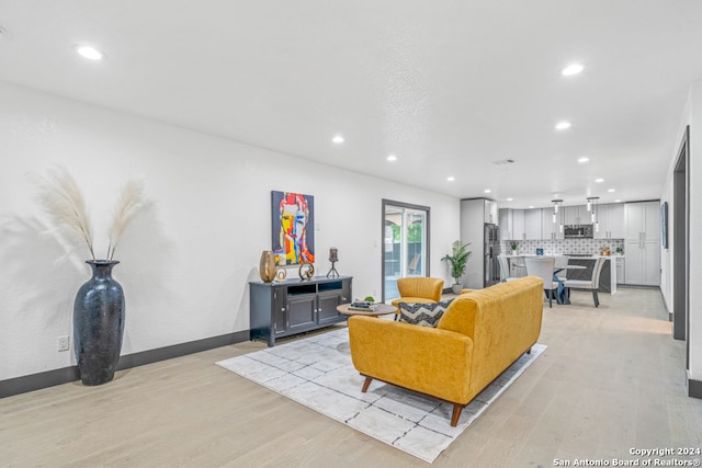 living room featuring light wood-type flooring