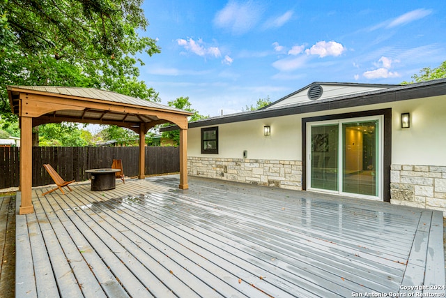 wooden terrace with a gazebo