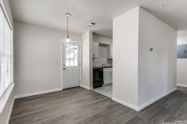 entryway with hardwood / wood-style flooring