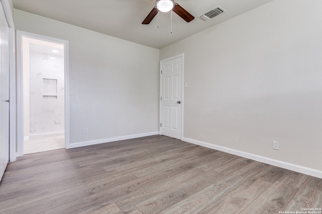 unfurnished room featuring wood-type flooring and ceiling fan