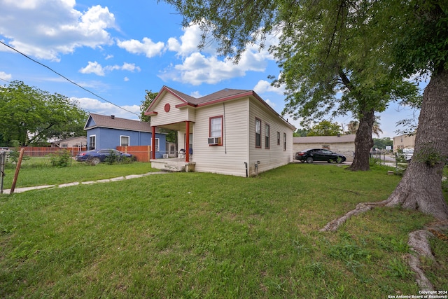 view of front of home with a front lawn