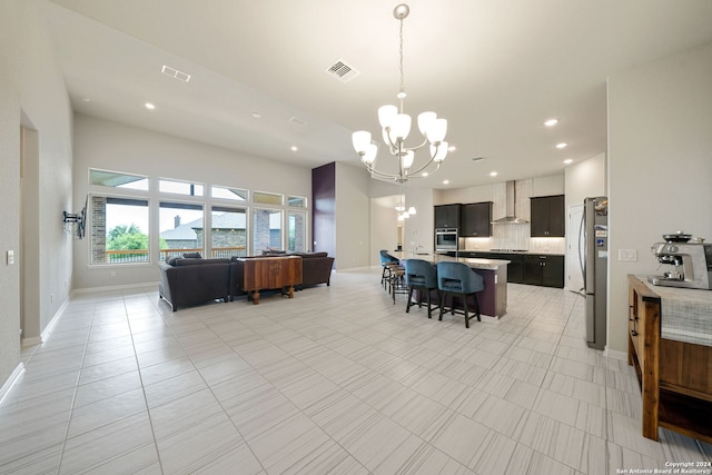 tiled dining area featuring an inviting chandelier