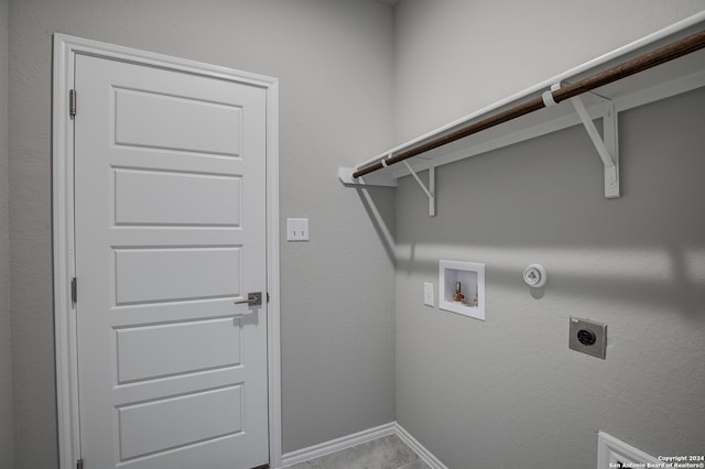 laundry room featuring washer hookup, tile patterned flooring, hookup for a gas dryer, and electric dryer hookup