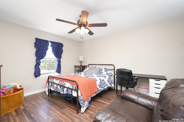 bedroom featuring wood-type flooring and ceiling fan