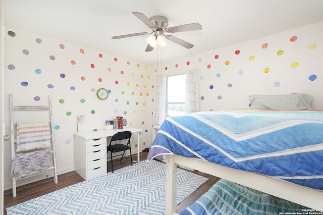 bedroom featuring hardwood / wood-style flooring and ceiling fan