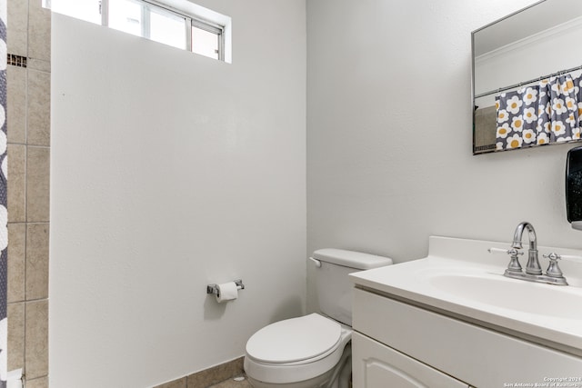 bathroom with vanity and toilet