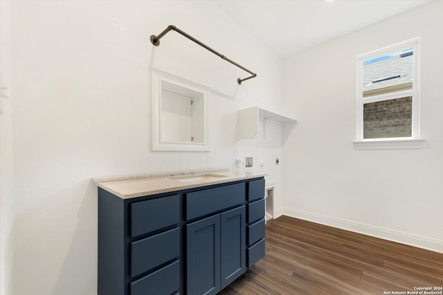 bathroom with wood-type flooring and vanity