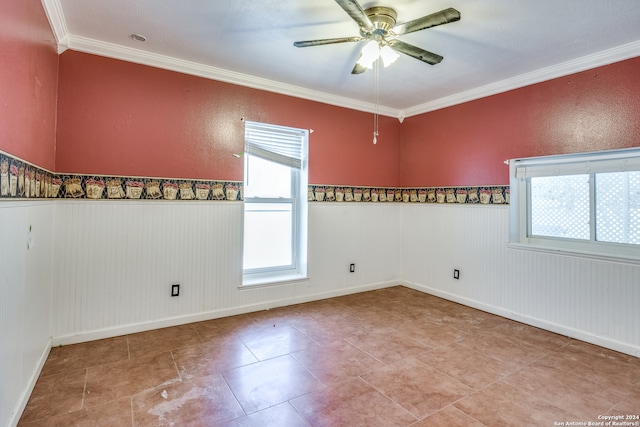 unfurnished room featuring a wealth of natural light, ceiling fan, and tile floors