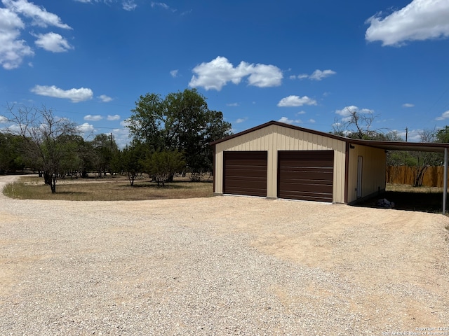 garage with a carport