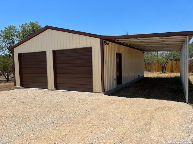 garage with a carport