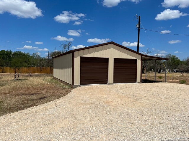 garage with a carport