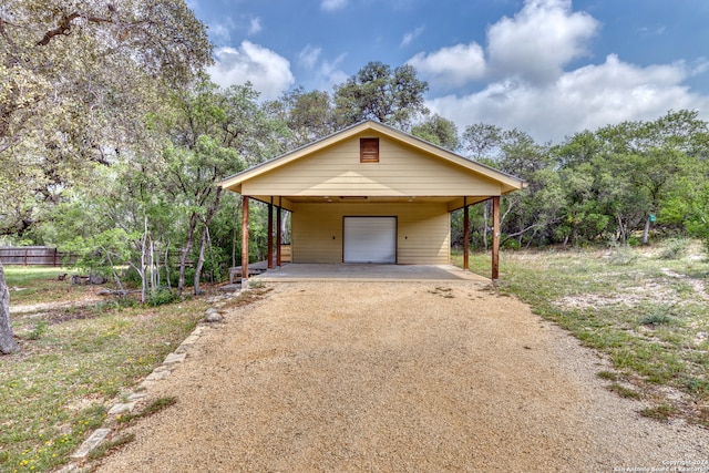 view of front of home with a carport