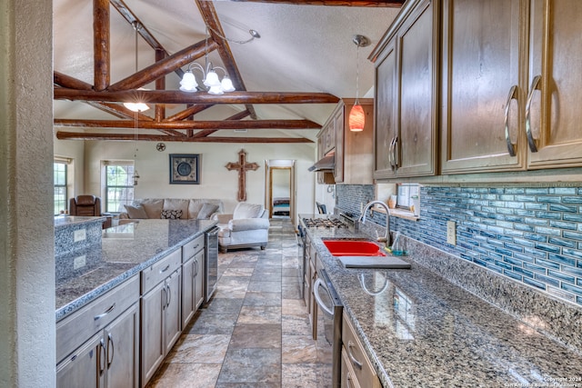 kitchen with tile flooring, vaulted ceiling with beams, sink, backsplash, and decorative light fixtures