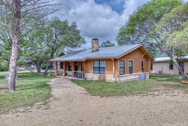 log home featuring central AC