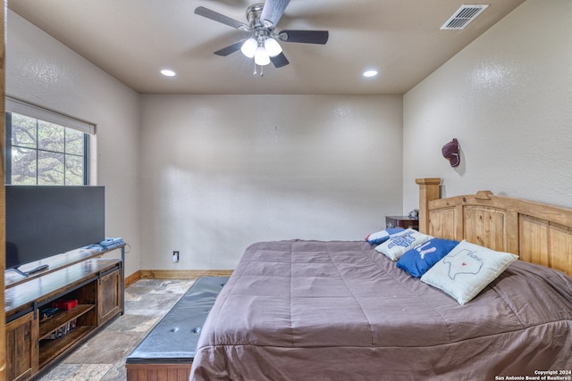 bedroom featuring tile flooring and ceiling fan