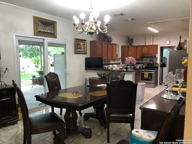 dining area featuring a chandelier, crown molding, and light tile floors