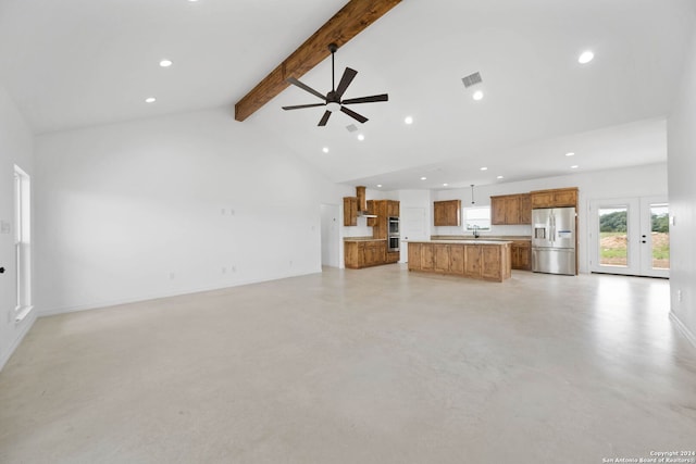 unfurnished living room with beamed ceiling, high vaulted ceiling, french doors, and ceiling fan