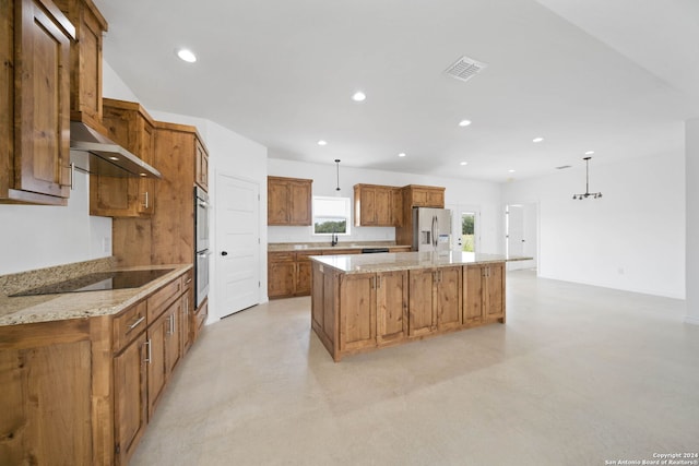 kitchen featuring light stone countertops, black electric stovetop, stainless steel refrigerator with ice dispenser, a kitchen island, and hanging light fixtures