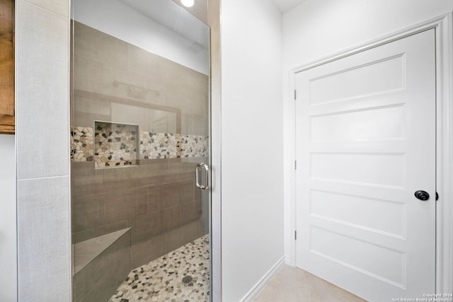 bathroom featuring walk in shower